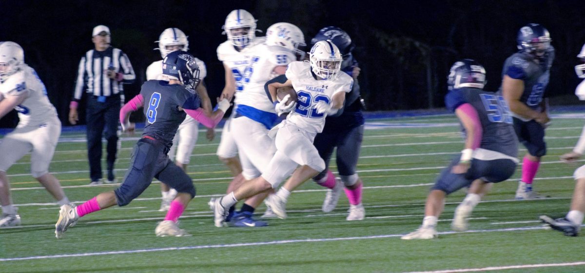 Sophomore Alexander Gaugler running the ball during the Homecoming Game.   