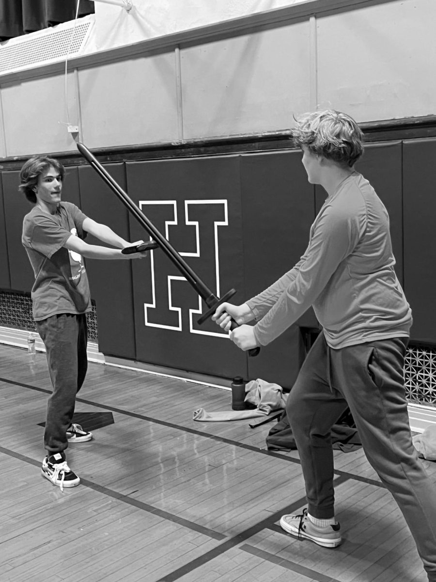 Senior Oliver Petkus and Freshman James Llewellyn practice their sword skills during the October 28 Stage Combat Workshop for Haldane Drama's production of Macbeth.