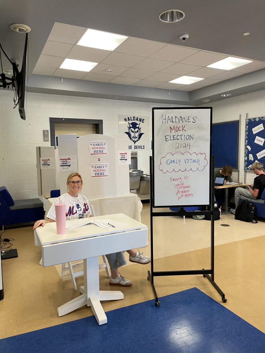 History teacher, Kaitlyn Secor begins the polling for Haldane Students' mock election held in November. 