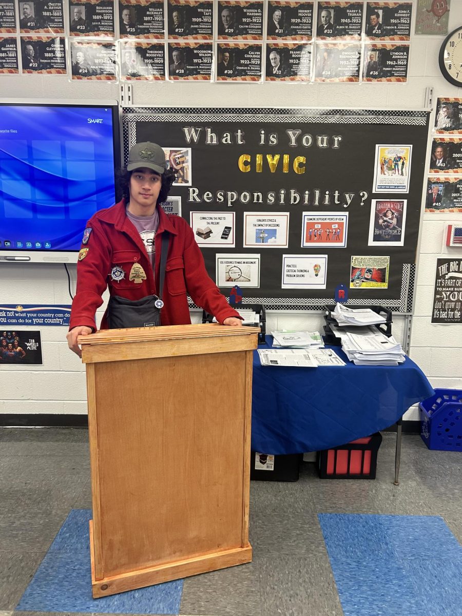 Louis Ferreira along with one of his handcrafted standing desks.