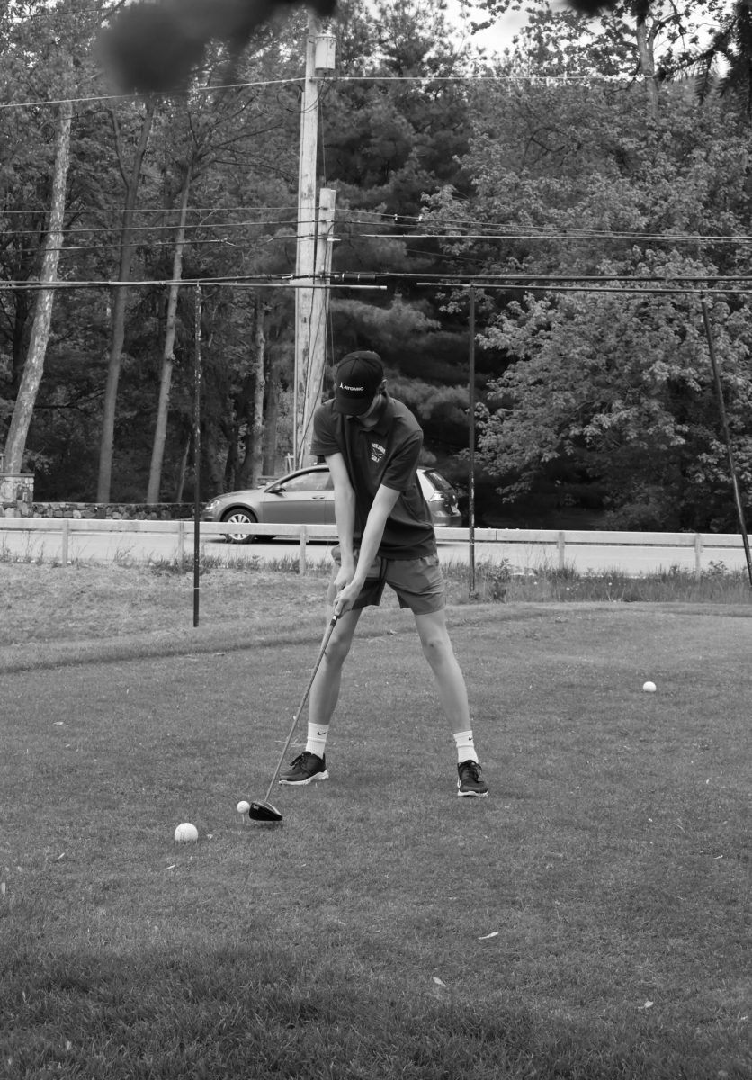 Junior George Stubbs at the Highlands Country Club teeing off during the April 2025 season.