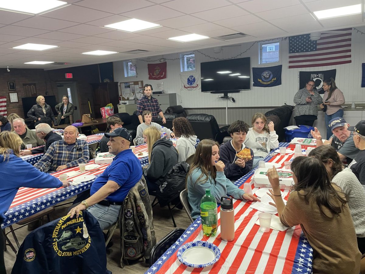 Students, Veterans, and event organizers compete in a series of trivia challenges in the VFW Hall on November 14.