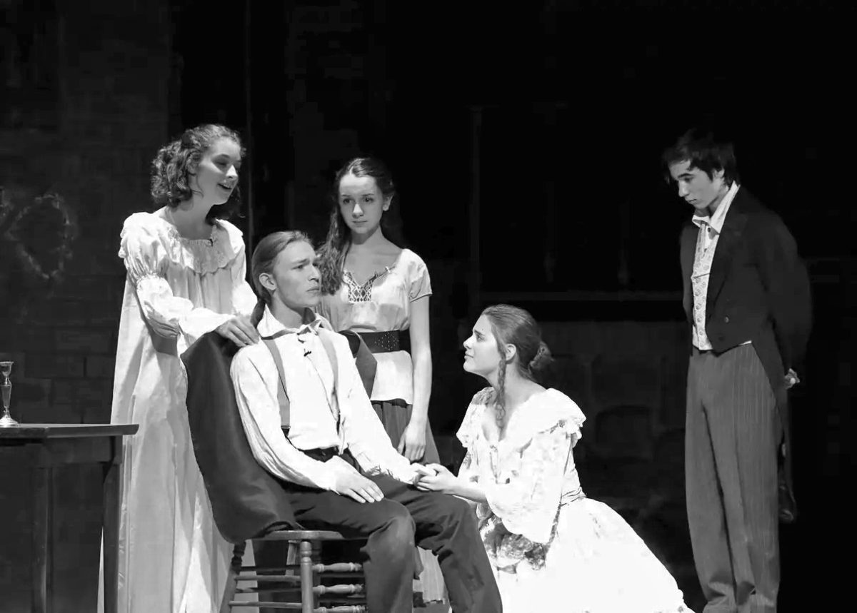 Haldane actors, including William Speziale, Justin Roffman, and Juliette Barkman, perform Les Misérables in the Haldane Auditorium in March 2018.