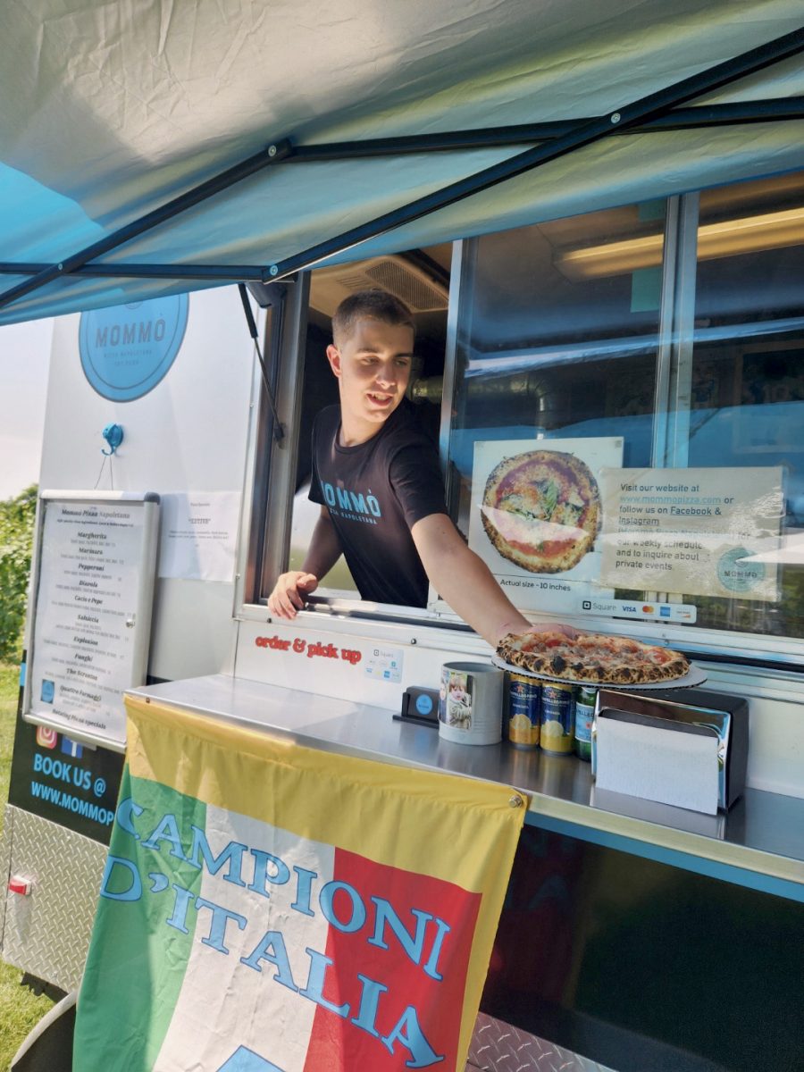 Senior Roth Westphal works at Mommó, a local pizza truck on Route 9, on Sunday, July 6, 2025. Westphal returned to the job this year for his senior internship from Monday, May 18 to Tuesday, June 9, 2026.