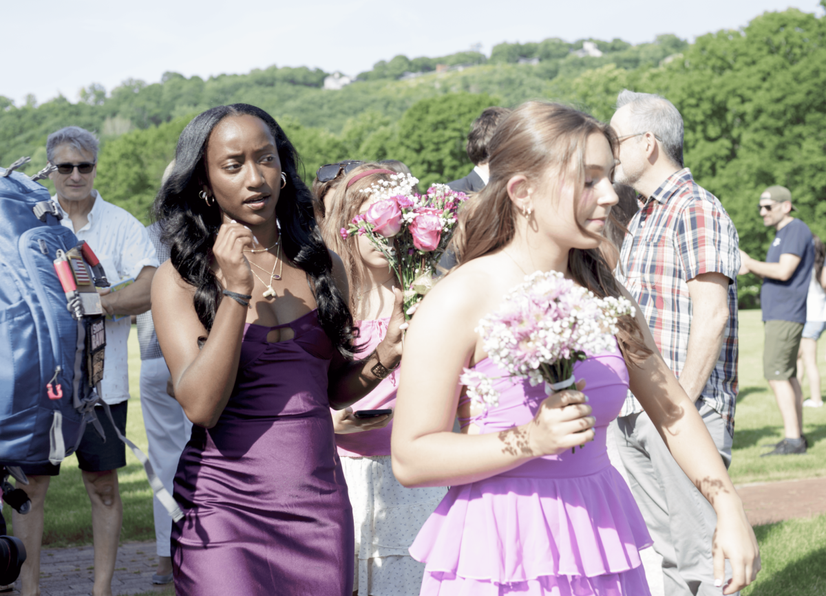 Juniors Taya Robinson and Sydney Merriman prepare for the junior class photo at Boscobel House and Gardens in Garrison, NY before heading over to Bear Mountain Inn for the dinner and dance on Friday, June 5, 2026.